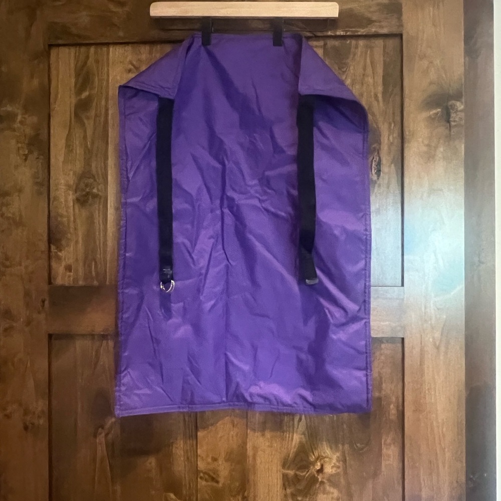 Retro purple butt flap for skiing. Stay dry  in a retro ski flap!